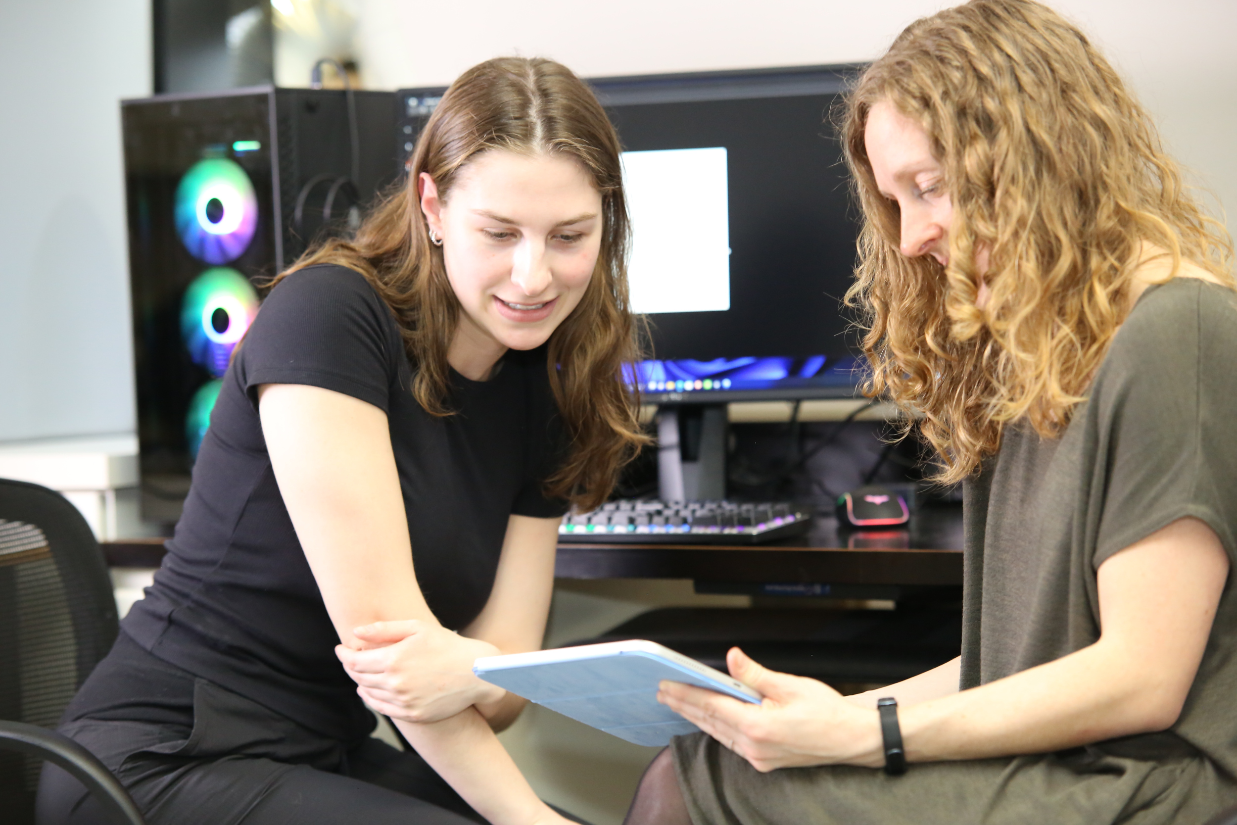 Someone working on computer 10